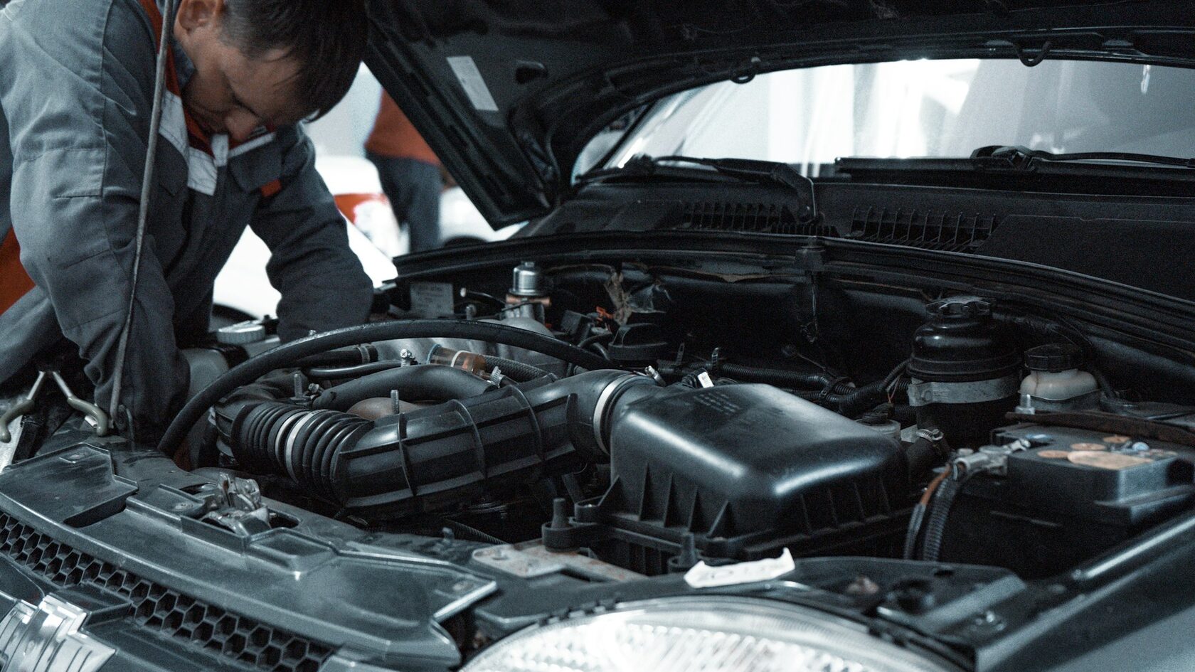 Leon Mechanical technician working on a car engine